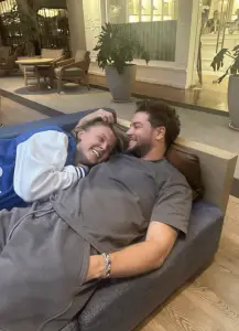 JoJo Siwa and Chris Hughes reignite romance rumors with cozy new photos from ‘happiest’ week: ‘Has to be a hard launch’