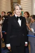 Andie MacDowell suits up in classic tuxedo on Cannes Film Festival 2025 red carpet