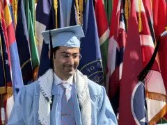 Columbia's Mohsen Mahdawi, fresh out of U.S. detention, walks the graduation stage