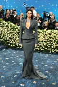 Kendall Jenner wears plunging skirt suit and diamonds on Met Gala 2025 red carpet