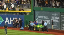 Fan who fell over wall onto field at Pirates game 'awake and alert,' GoFundMe says
